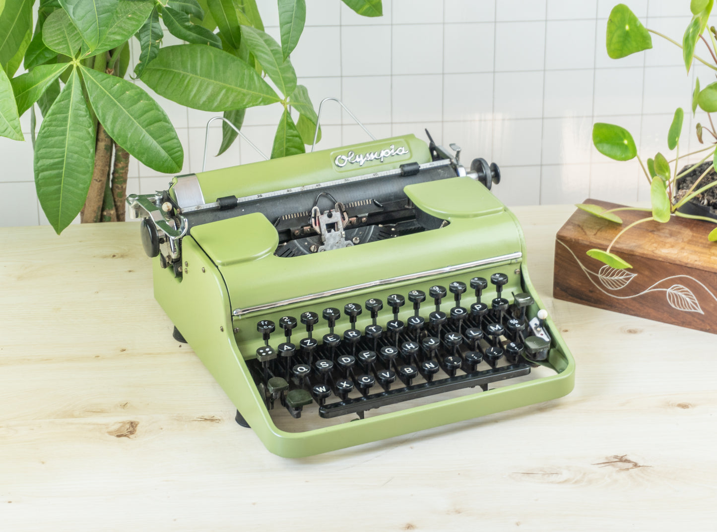 Olive green Olympia typewriter